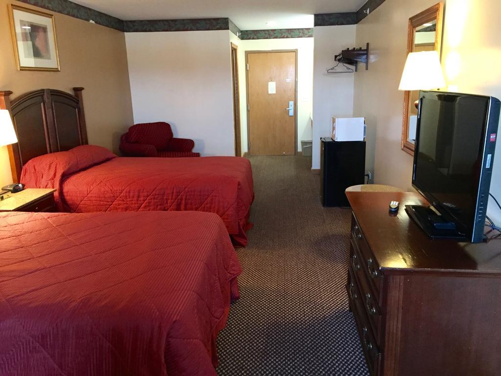 Executive Inn And Suites Уокиган Стая снимка