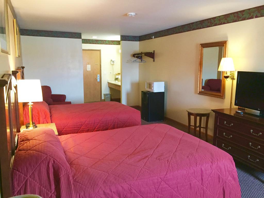 Executive Inn And Suites Уокиган Стая снимка