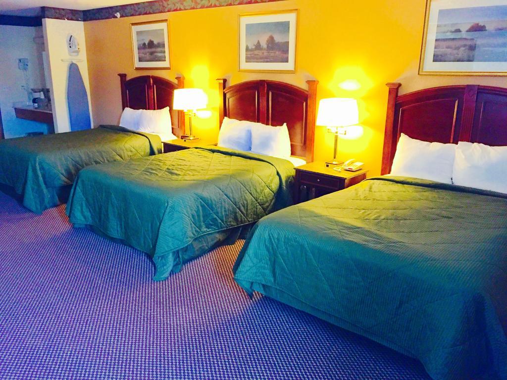 Executive Inn And Suites Уокиган Стая снимка